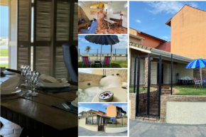 Casa a Beira Mar com Banheira de Hidromagem, Wi-fi, Vista mar e Churrasqueira